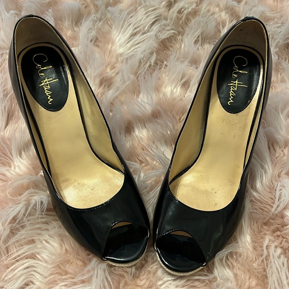 Cole Haan black patent leather pumps.
